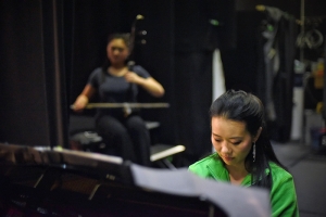 Pianist Huichen Chen rehearsing with erhu soloist Linda Wang backstage at The Regal Theatre in Perth, Australia, where Shen Yun World Company performed nine shows. (photo by dancer Lily Wang)