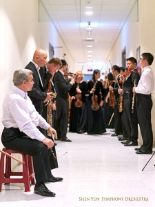 Backstage, the Symphony members are almost ready to enter the concert hall.