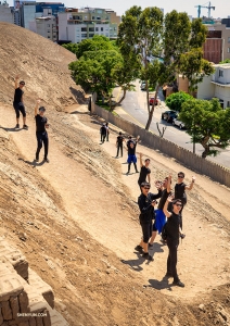 The group heads back to regular city buildings after exploring the pyramid located right in the middle of Lima.

(Photo by dancer Tony Xue)